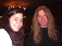 John Young with Sharan at the John Wetton Fan Convention, July 2002